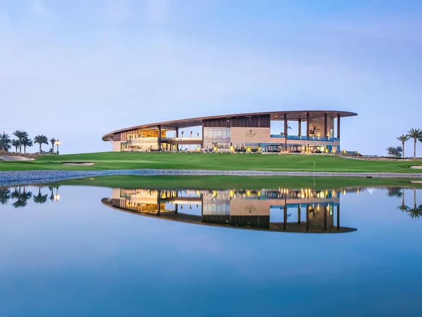 Trump International Golf Club Dubai clubhouse beside Cavalli Estates in DAMAC Hills
